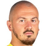 T. Mujan