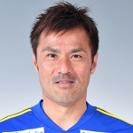 Y. Komano